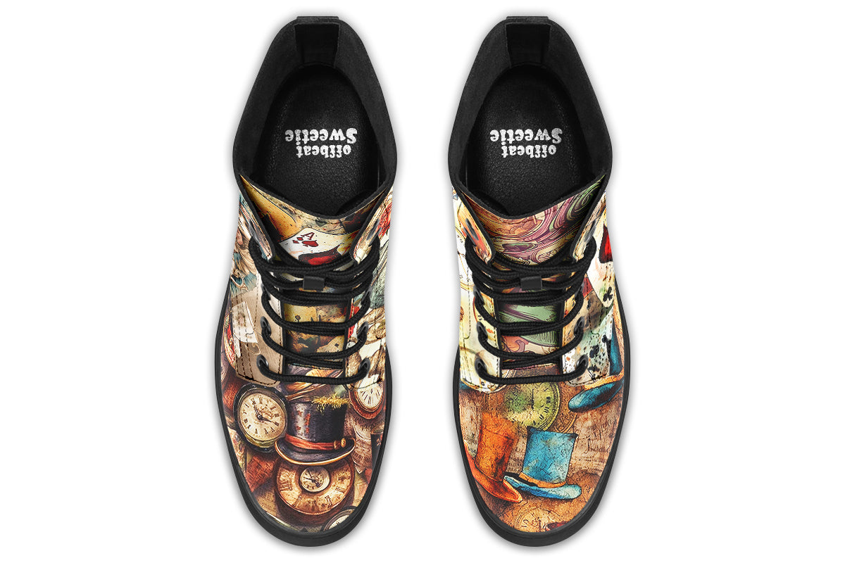 Mismatched beige coloured boots in Alice In Wonderland theme, with each side featuring a different design such as mad hatter, rabbits with clocks, playing cards etc