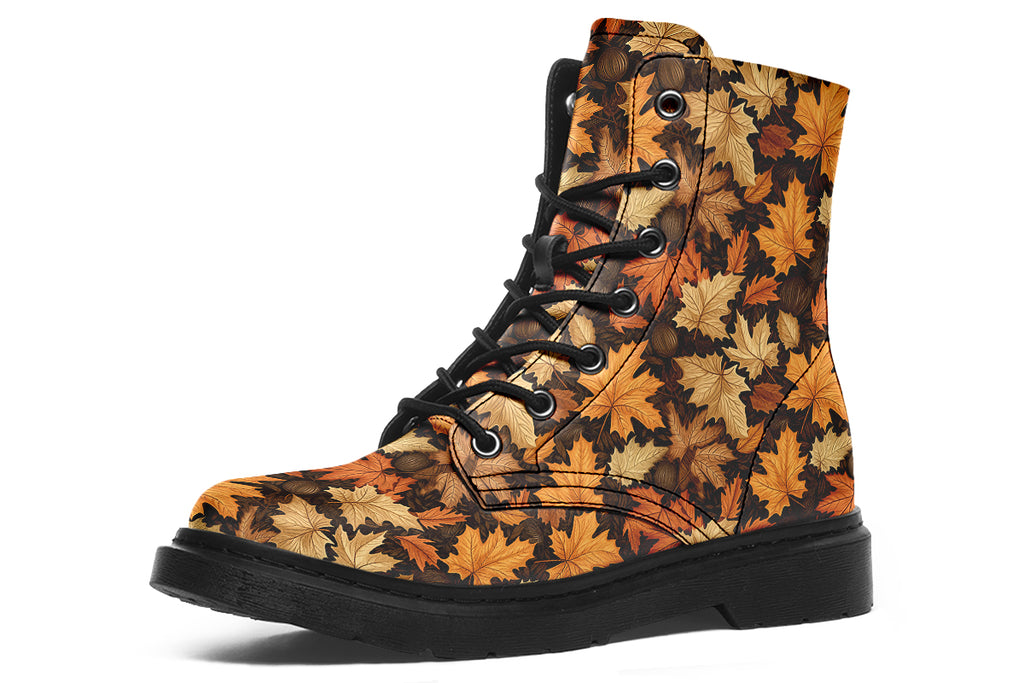Dark brown boots featuring a pattern of autumn leaves in different shades of browns