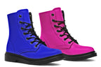 Mismatched boots, one all pink and one all blue.
