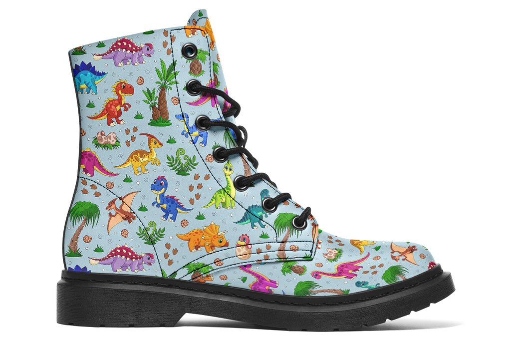 Light blue boots with a pattern of different coloured cute baby dinosaurs, prehistoric-looking trees and dinosaur eggs