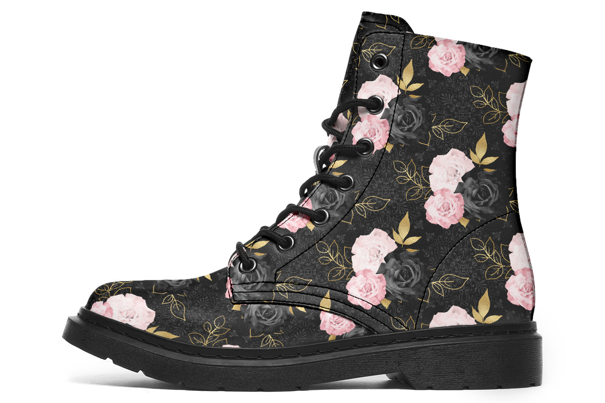 Black boots with a repetitive patterns of blush pink and black roses with gold leaves