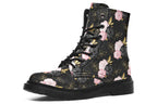Black boots with a repetitive patterns of blush pink and black roses with gold leaves