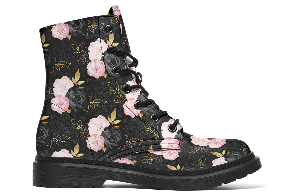 Black boots with a repetitive patterns of blush pink and black roses with gold leaves