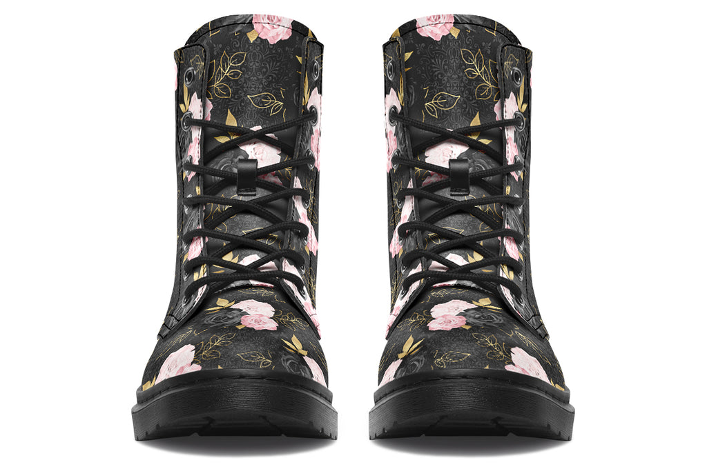 Black boots with a repetitive patterns of blush pink and black roses with gold leaves