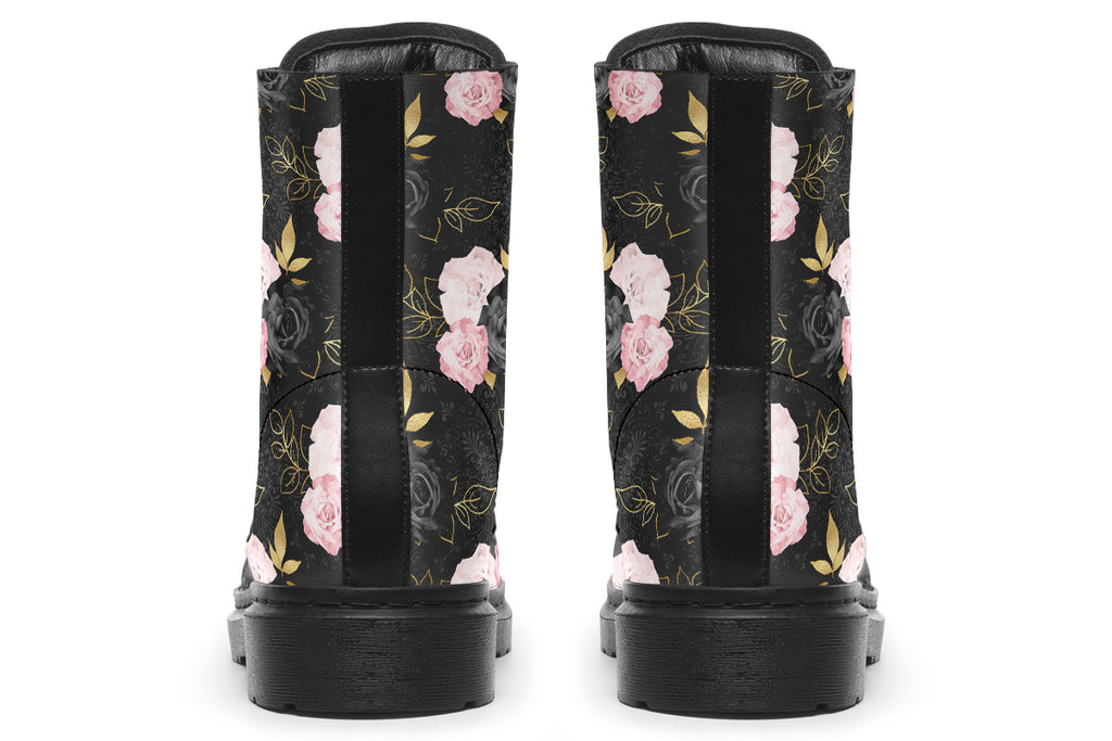 Black boots with a repetitive patterns of blush pink and black roses with gold leaves