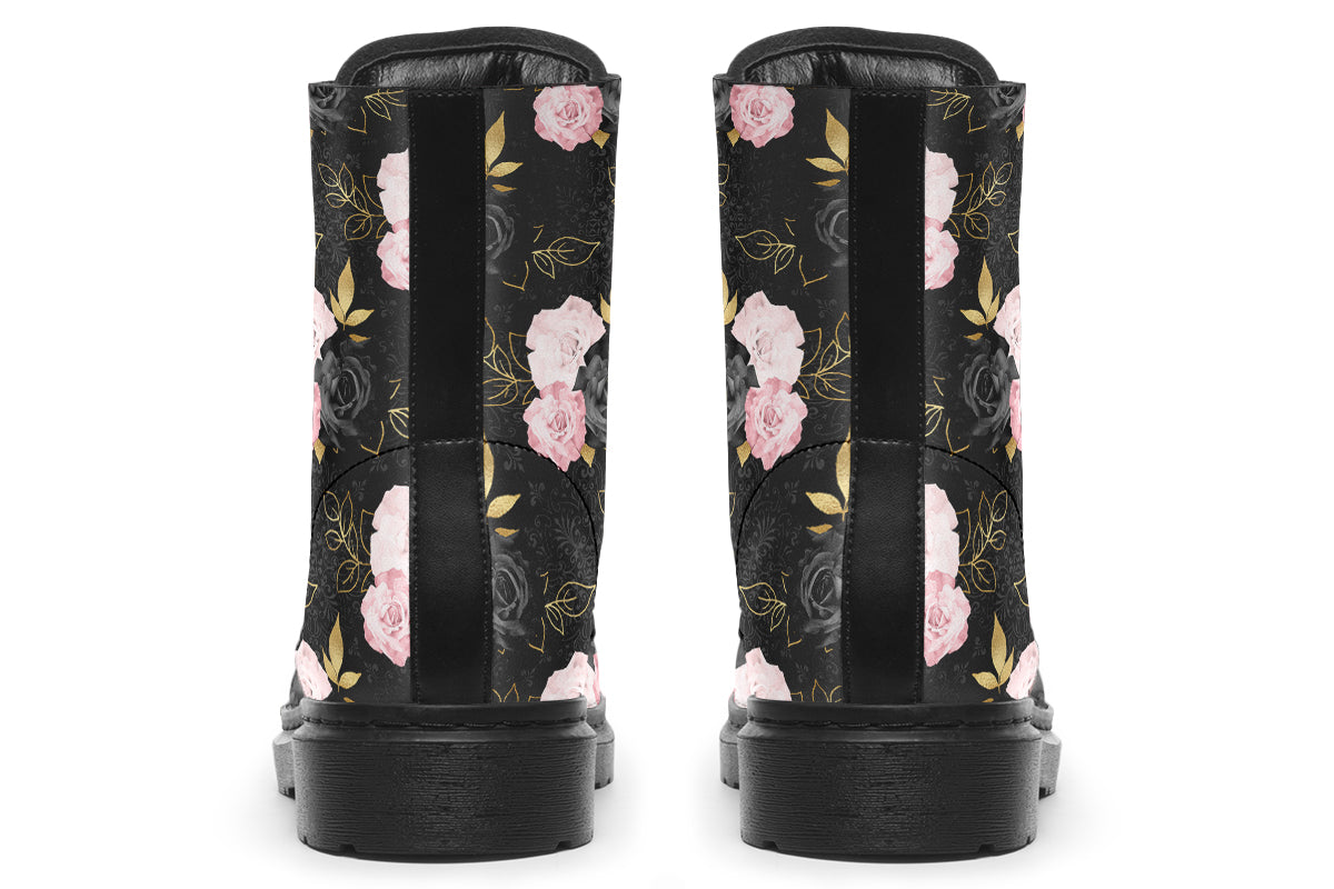 Black boots with a repetitive patterns of blush pink and black roses with gold leaves