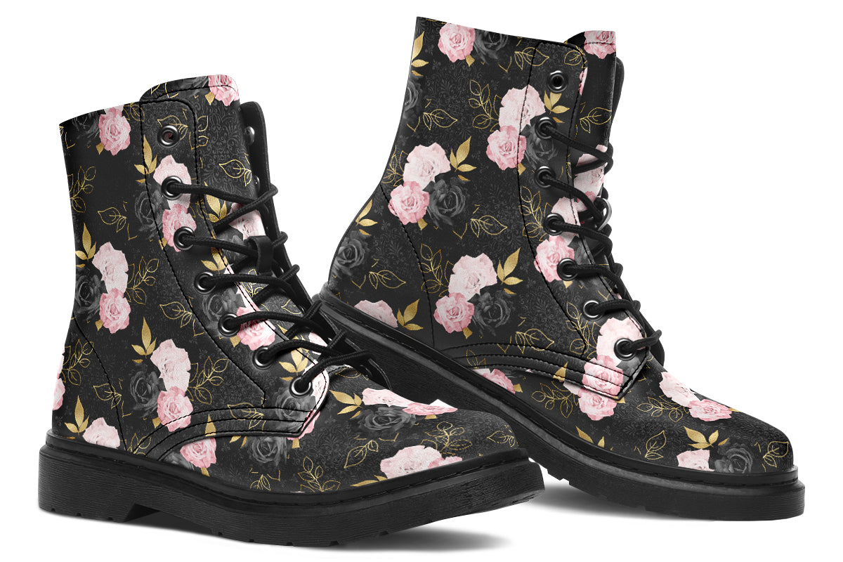 Black boots with a repetitive patterns of blush pink and black roses with gold leaves