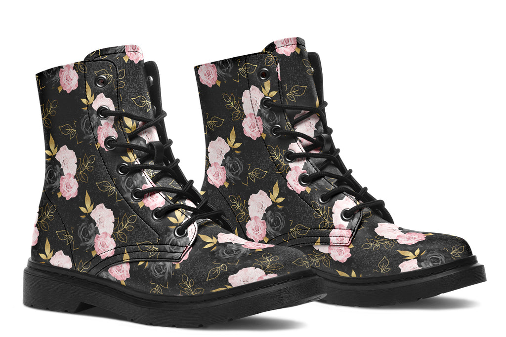 Black boots with a repetitive patterns of blush pink and black roses with gold leaves