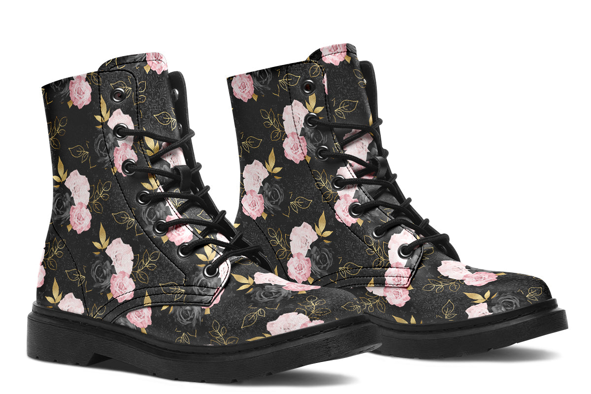 Black boots with a repetitive patterns of blush pink and black roses with gold leaves