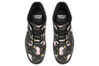 Black boots with a repetitive patterns of blush pink and black roses with gold leaves