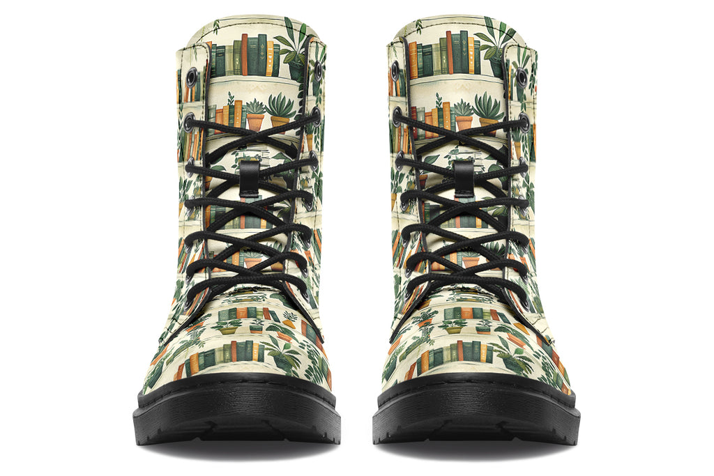 Cream coloured boots featuring a pattern of bookshelves with books and potted plants on them