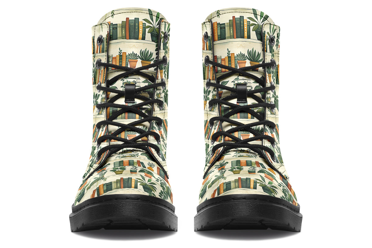 Cream coloured boots featuring a pattern of bookshelves with books and potted plants on them