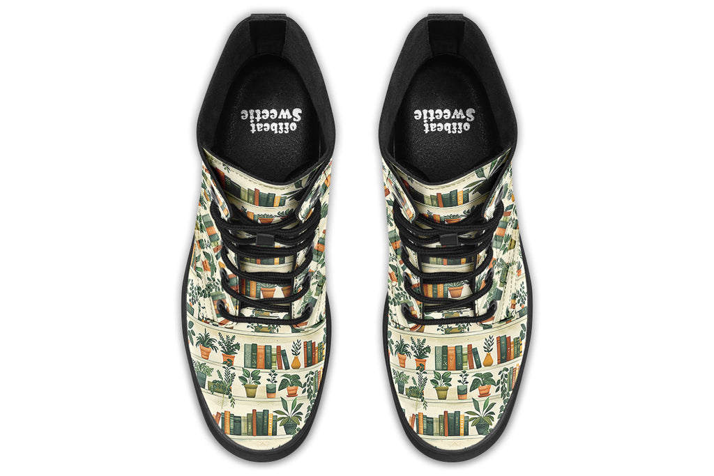Cream coloured boots featuring a pattern of bookshelves with books and potted plants on them