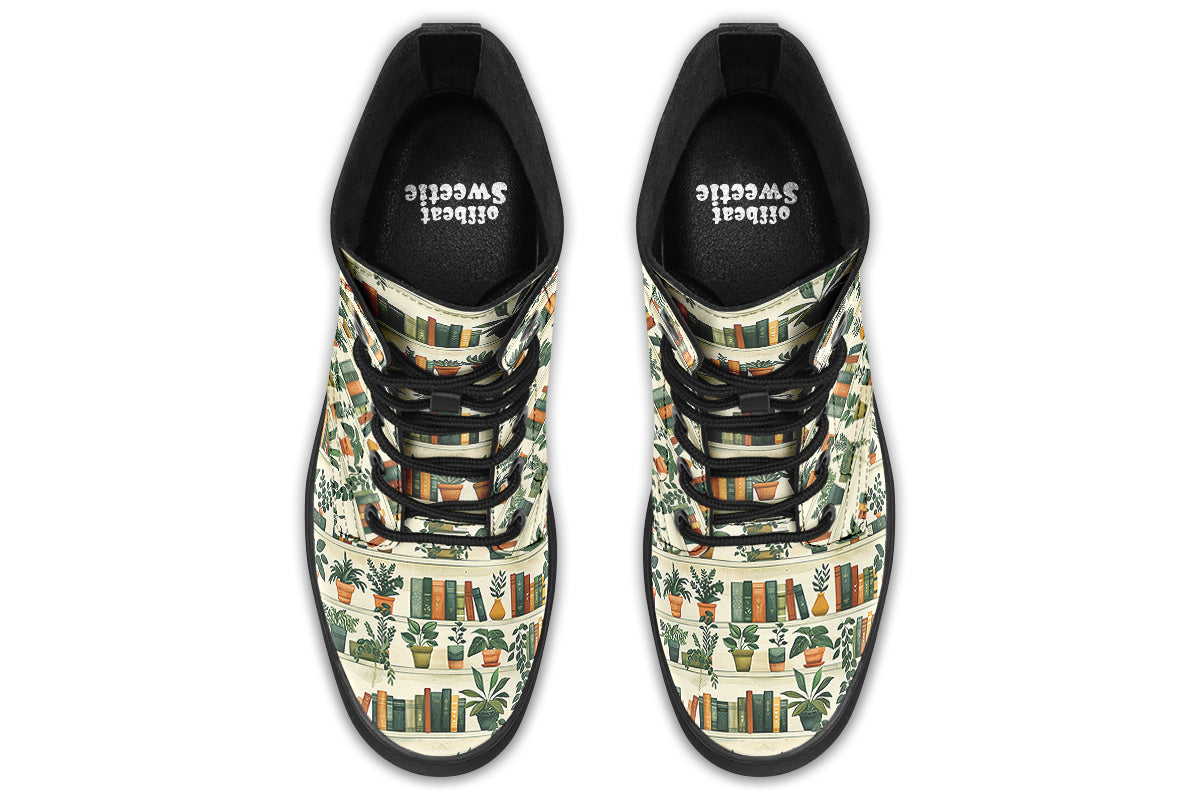 Cream coloured boots featuring a pattern of bookshelves with books and potted plants on them