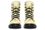 Light yellowish/cream boots with a pattern of faded gold honeycomb and sporadic bees