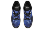 Deep blue boots with an image of white butterflies flying at night around stars and the moon