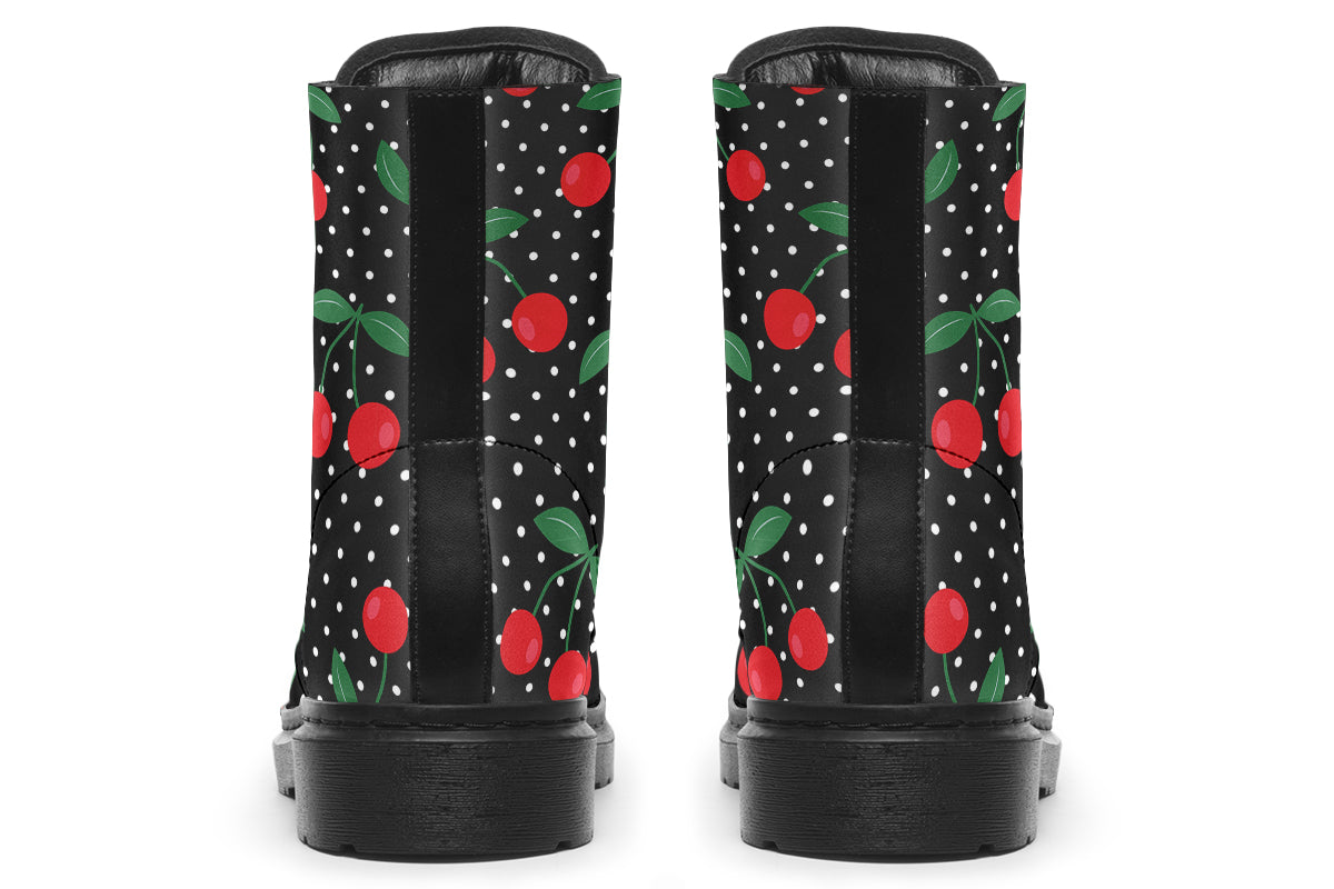 Black boots with a pattern of red cherries and white polka dots