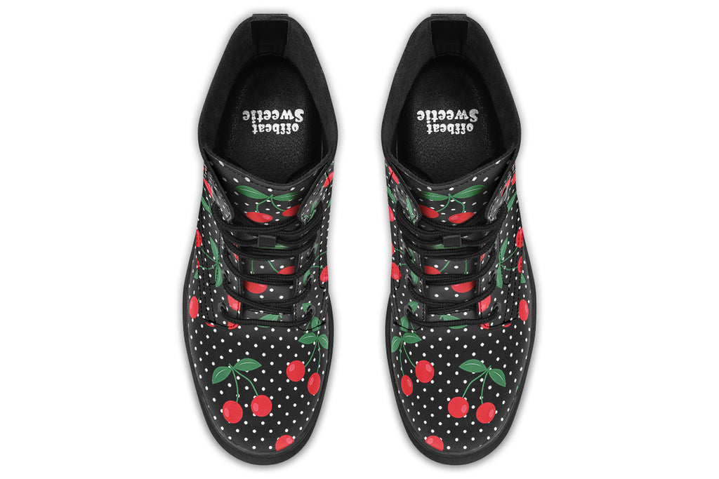 Black boots with a pattern of red cherries and white polka dots