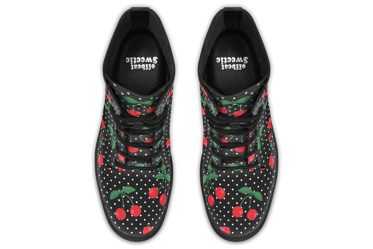 Black boots with a pattern of red cherries and white polka dots