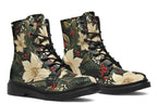 Boots featuring a design with deep green leaves, white flowers and red berries.