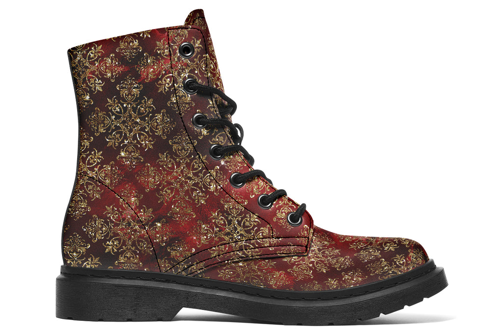 Boots in a deep red and gold textured pattern, like one might find on Christmas wrapping paper