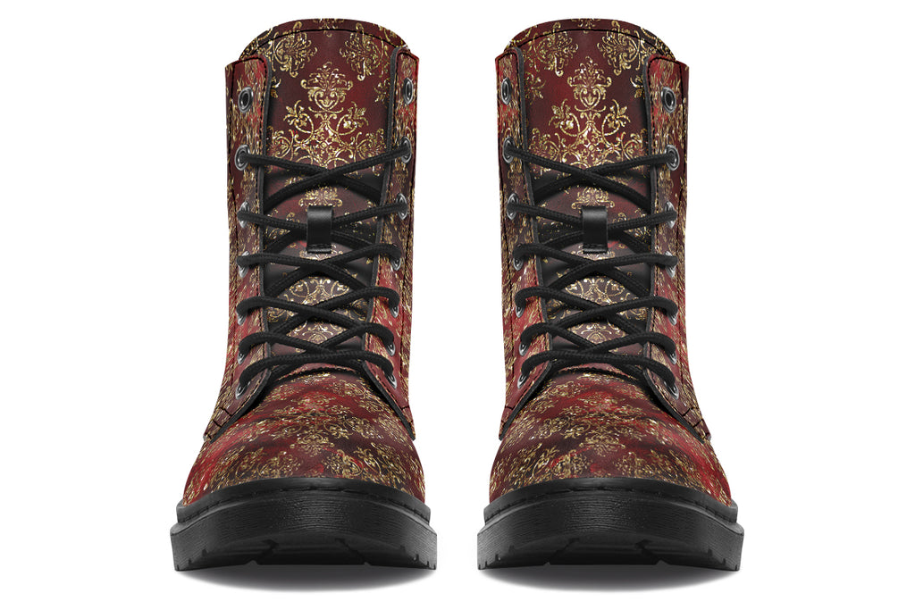 Boots in a deep red and gold textured pattern, like one might find on Christmas wrapping paper