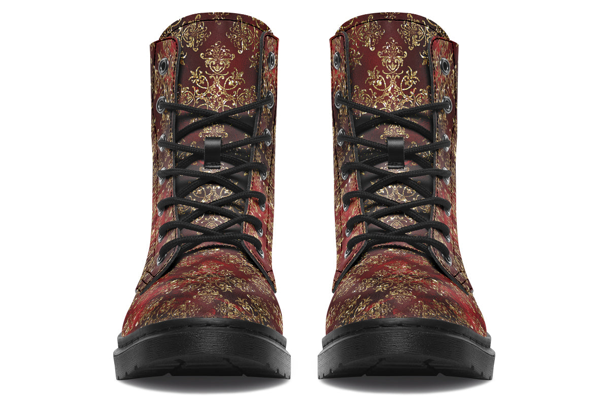 Boots in a deep red and gold textured pattern, like one might find on Christmas wrapping paper
