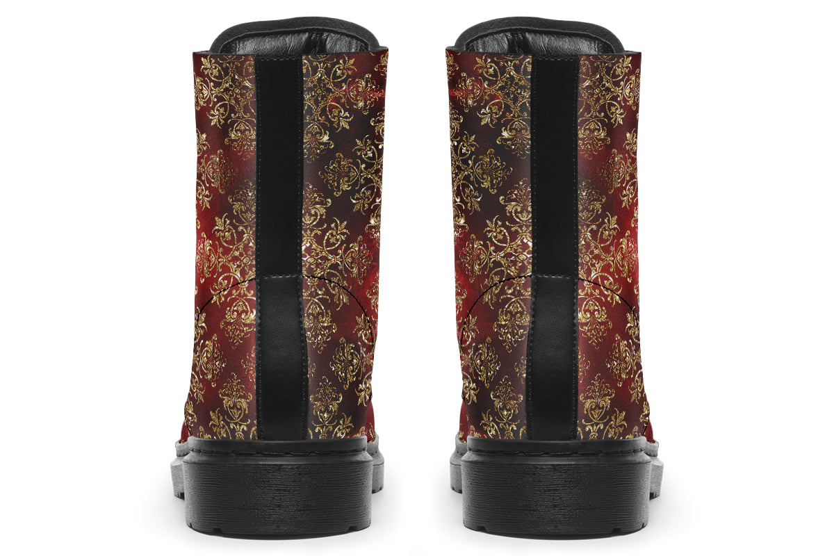 Boots in a deep red and gold textured pattern, like one might find on Christmas wrapping paper
