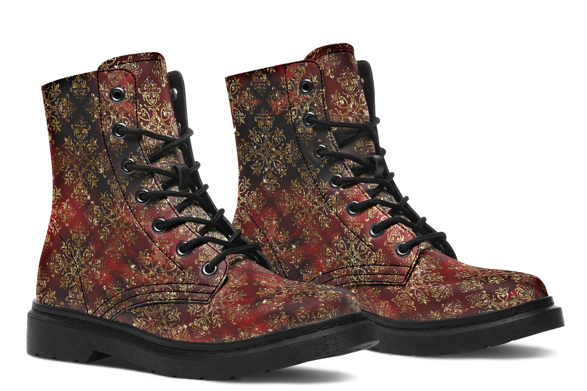 Boots in a deep red and gold textured pattern, like one might find on Christmas wrapping paper