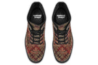 Boots in a deep red and gold textured pattern, like one might find on Christmas wrapping paper