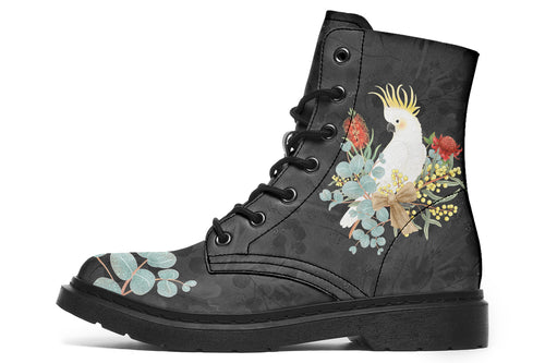 Boots with a subtle black leaves background, with an image of a cockatoo and Australian flora