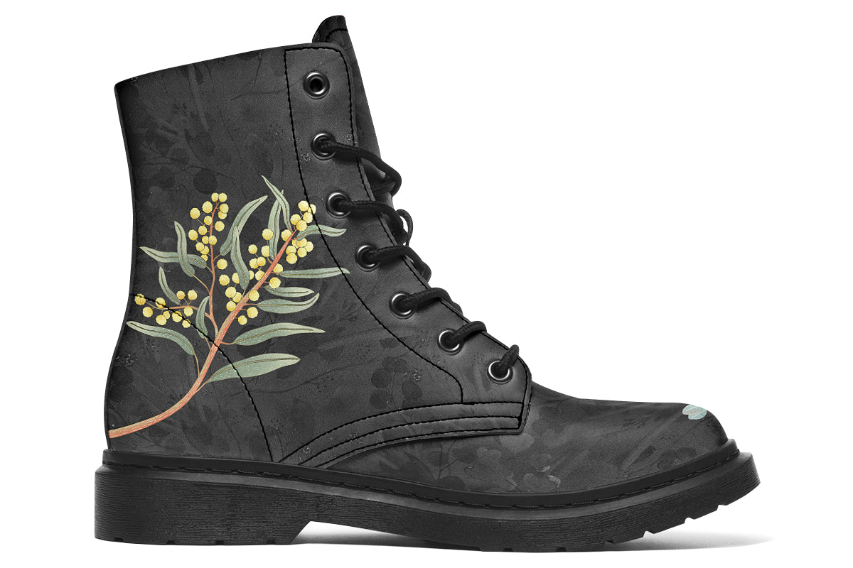 Boots with a subtle black leaves background, with an image of a cockatoo and Australian flora