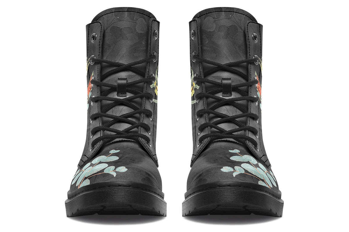 Boots with a subtle black leaves background, with an image of a cockatoo and Australian flora