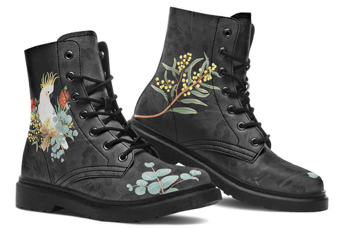 Boots with a subtle black leaves background, with an image of a cockatoo and Australian flora