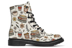 Design features icons of coffee, books and botanicals on an off-white background
