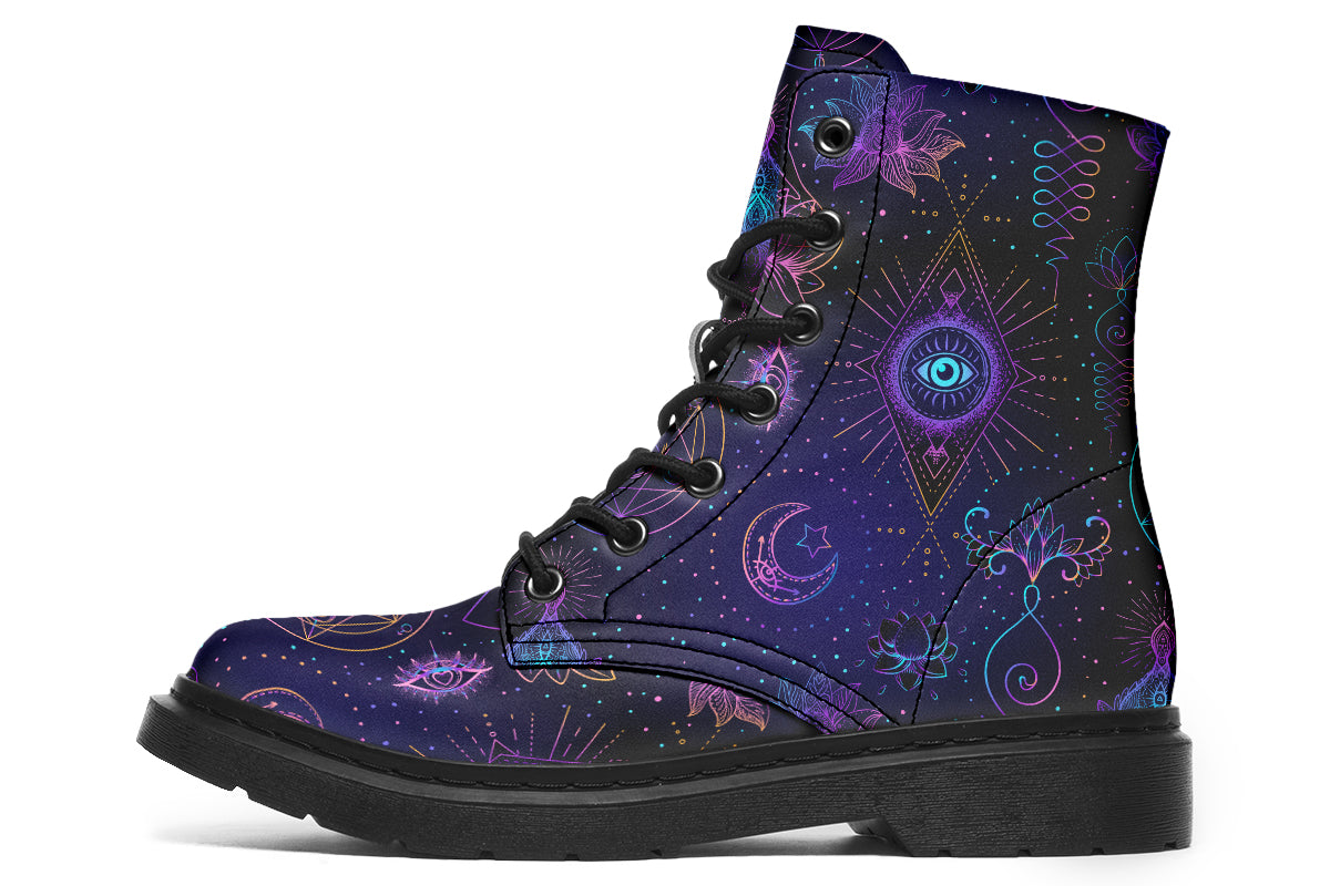 Boots featuring a dark violet, almost black background with a rainbow gradient pattern of different symbols such as a lotus flower, moon, star, decorative dots and swirls and a blue eye surrounded by a circle and line patterns.