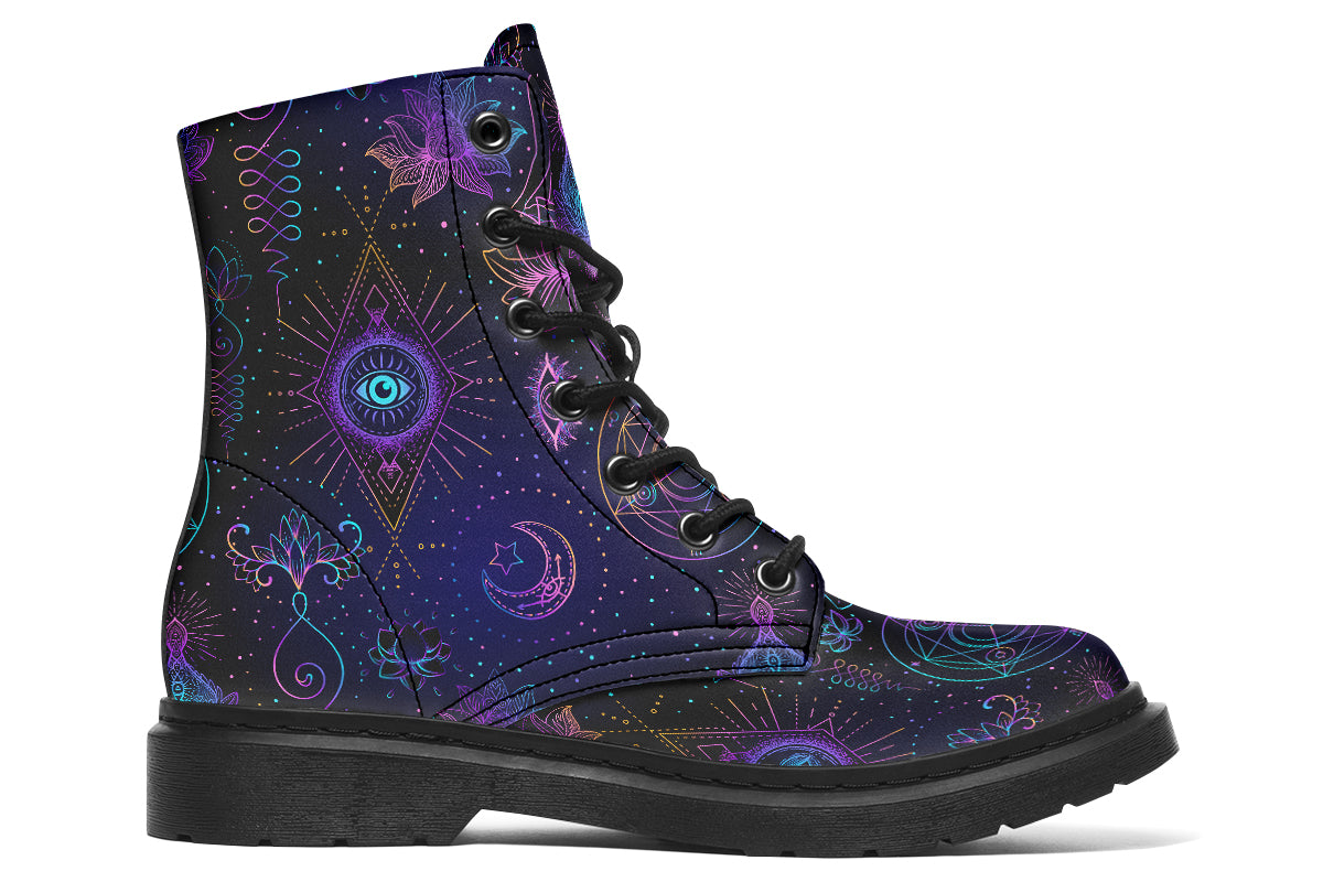 Boots featuring a dark violet, almost black background with a rainbow gradient pattern of different symbols such as a lotus flower, moon, star, decorative dots and swirls and a blue eye surrounded by a circle and line patterns.
