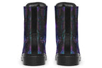 Boots featuring a dark violet, almost black background with a rainbow gradient pattern of different symbols such as a lotus flower, moon, star, decorative dots and swirls and a blue eye surrounded by a circle and line patterns.