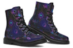 Boots featuring a dark violet, almost black background with a rainbow gradient pattern of different symbols such as a lotus flower, moon, star, decorative dots and swirls and a blue eye surrounded by a circle and line patterns.