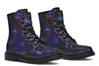 Boots featuring a dark violet, almost black background with a rainbow gradient pattern of different symbols such as a lotus flower, moon, star, decorative dots and swirls and a blue eye surrounded by a circle and line patterns.