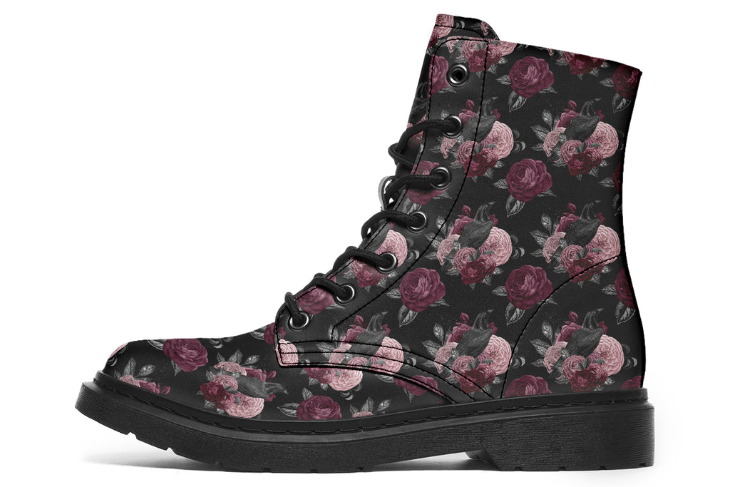 Black boots with a repetitive pattern of deep crimson and pink flowers with a black crow sitting in them