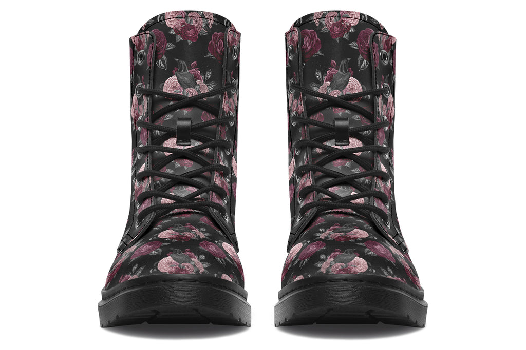 Black boots with a repetitive pattern of deep crimson and pink flowers with a black crow sitting in them