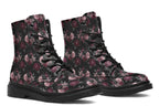 Black boots with a repetitive pattern of deep crimson and pink flowers with a black crow sitting in them