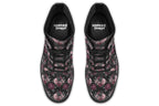 Black boots with a repetitive pattern of deep crimson and pink flowers with a black crow sitting in them