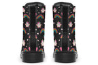 Black boots featuring a pattern of simple rainbows, pink clouds and cute smiling unicorns