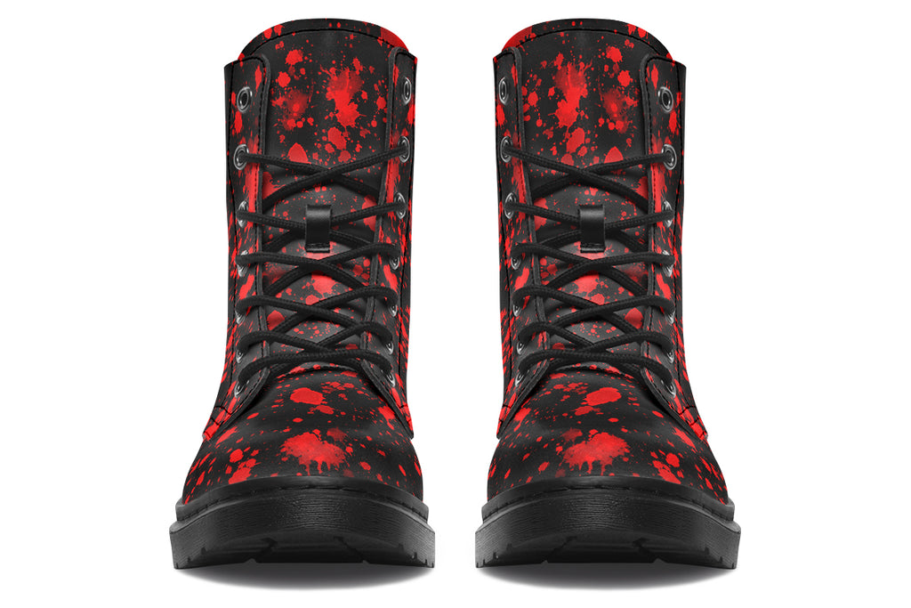 Black boots with red splatter pattern