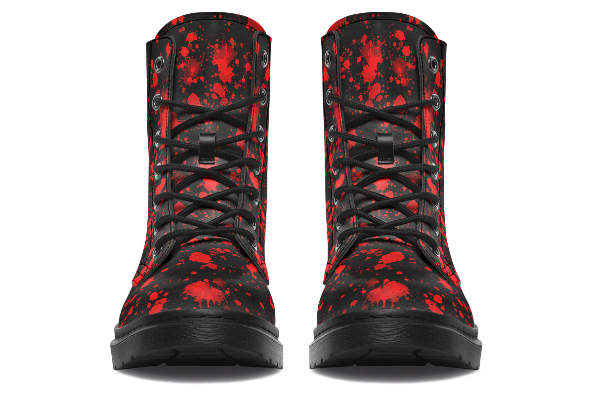Black boots with red splatter pattern