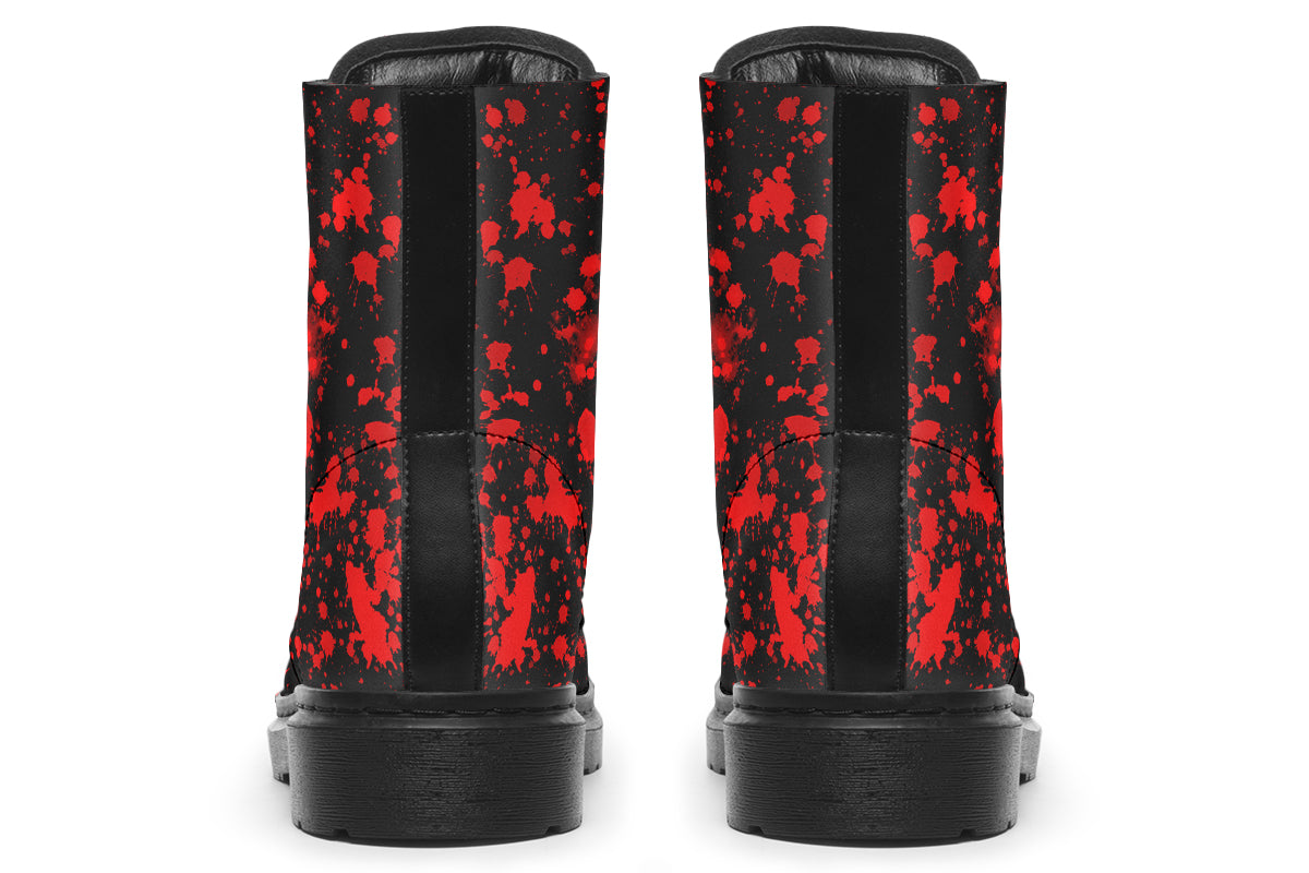 Black boots with red splatter pattern