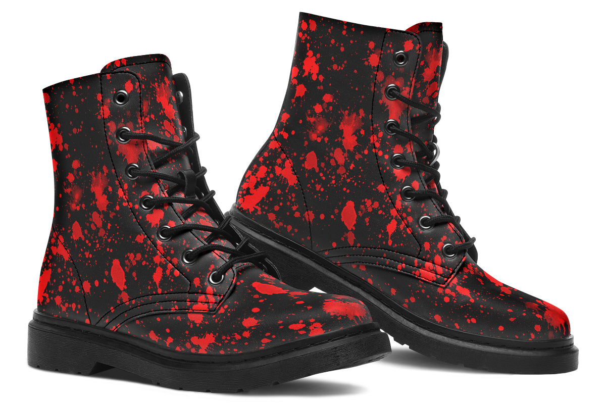 Black boots with red splatter pattern