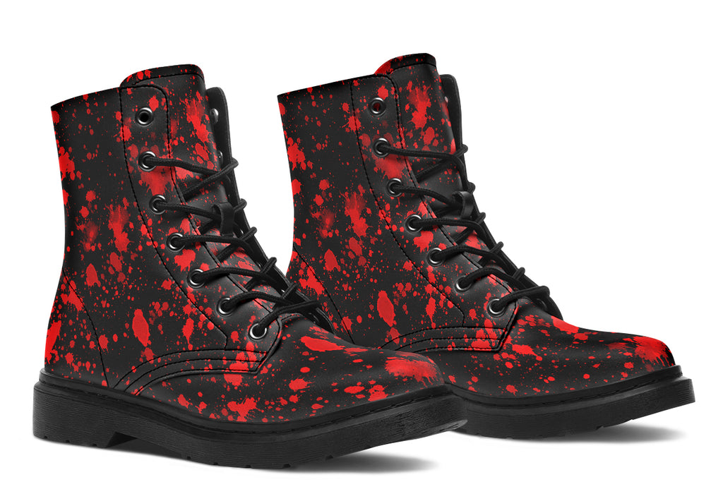 Black boots with red splatter pattern